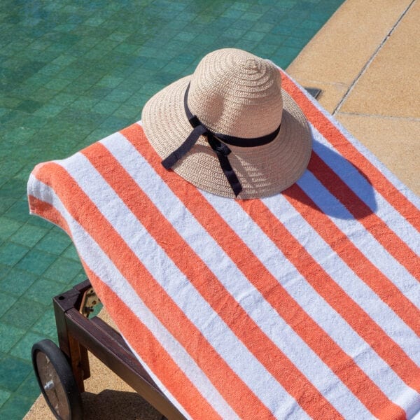 California Cabana Towels - Coral on poolchair