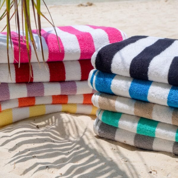 California Cabana Towels - group stacked neatly on the beach