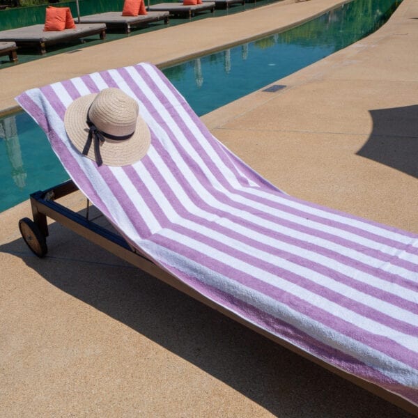 California Cabana Towels - Lavender on a poolbed