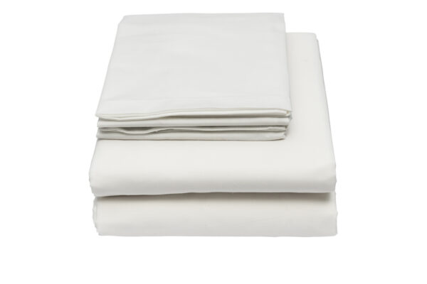 Folded bed linen or duvet cover on white isolated background